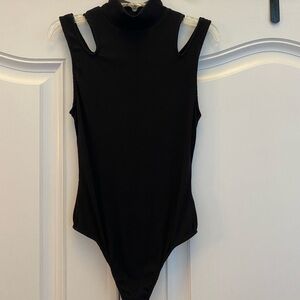 Free People sleeveless bodysuit. NWT. Size Large
